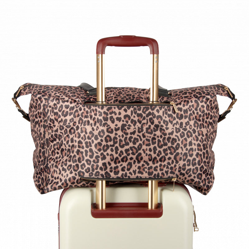 Weekendtas panterprint op koffer