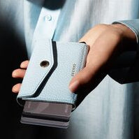 SECRID Envelope wallet ice blue in hand